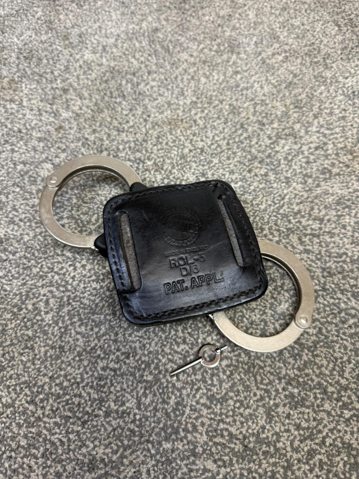 Police Hiatt Rigid Handcuffs & Leather Belt Pouch With Serial Security Cuffs Display Collectible